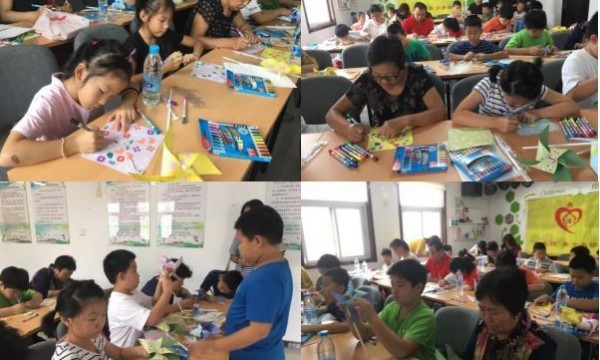 七彩风车 点缀生活——官悦欣园社区开展促融活动